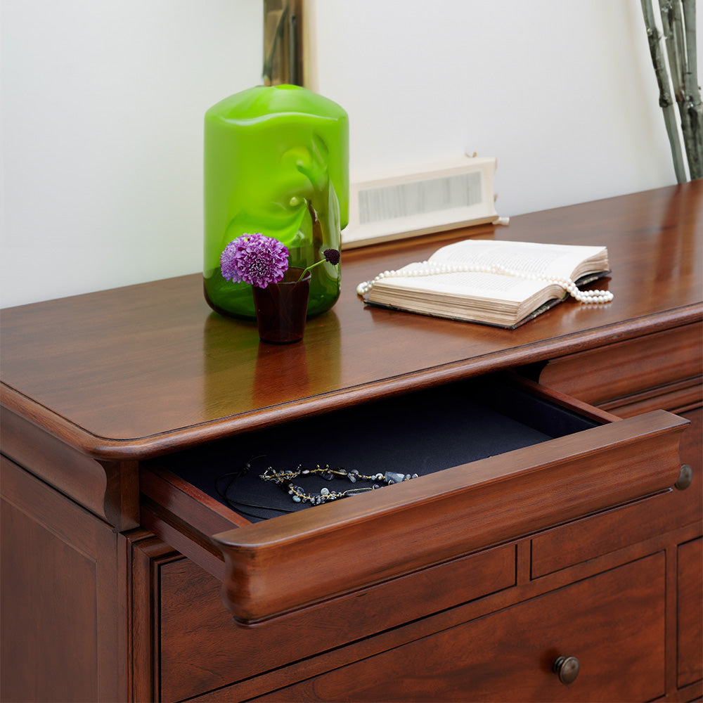 Wide 4 and 3 drawer chest crafted from solid wood veneers in rich cherrywood