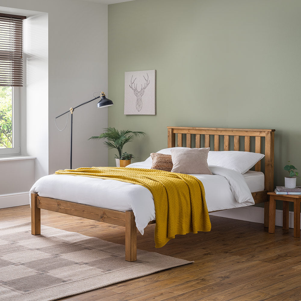 Solid wood bedframe in natural finish