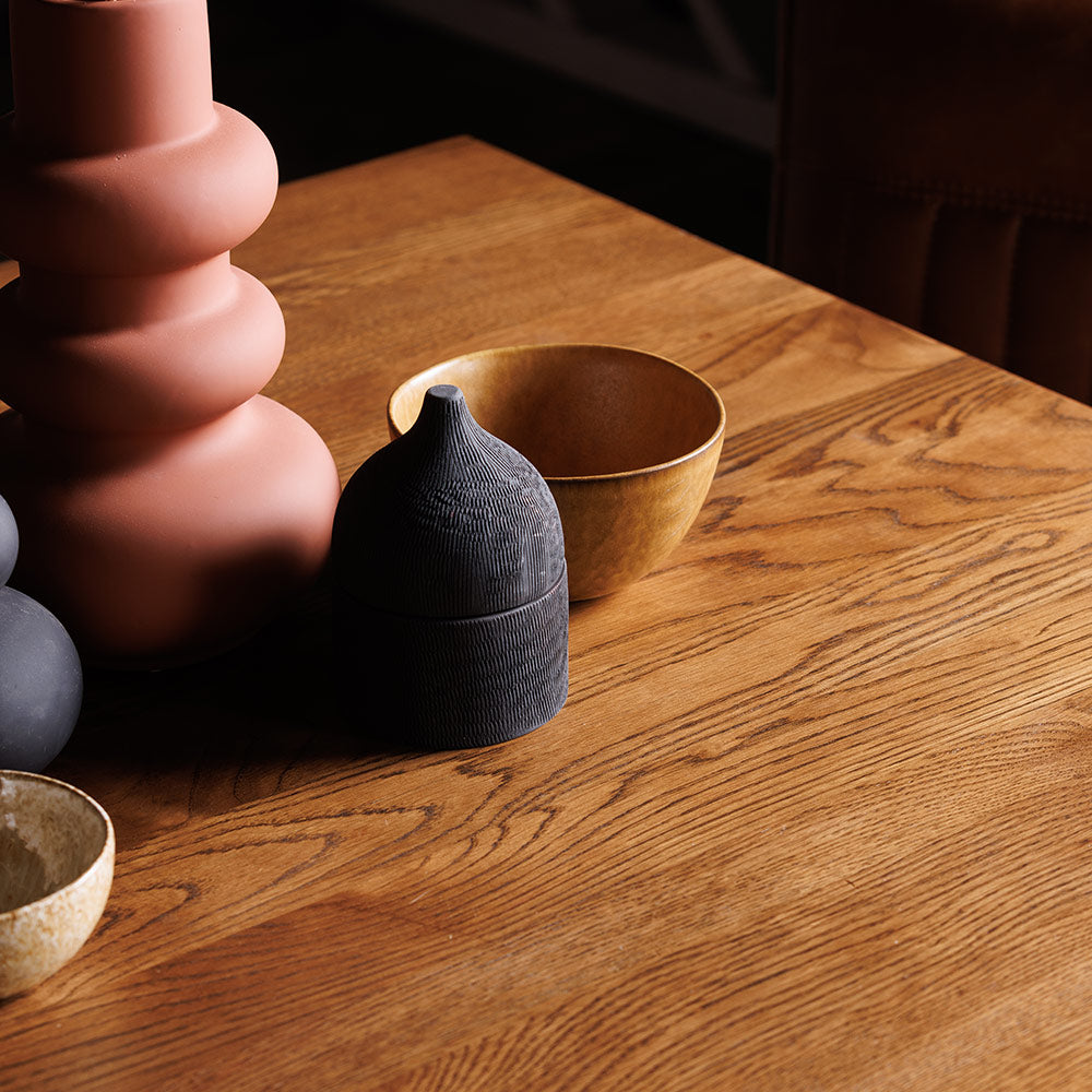 Rustic solid oak dining table with star burst effect black legs