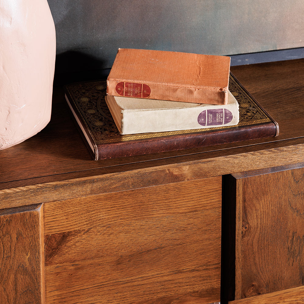 Solid oak checkerboard front sideboard in natural finish with black powder coated metal legs