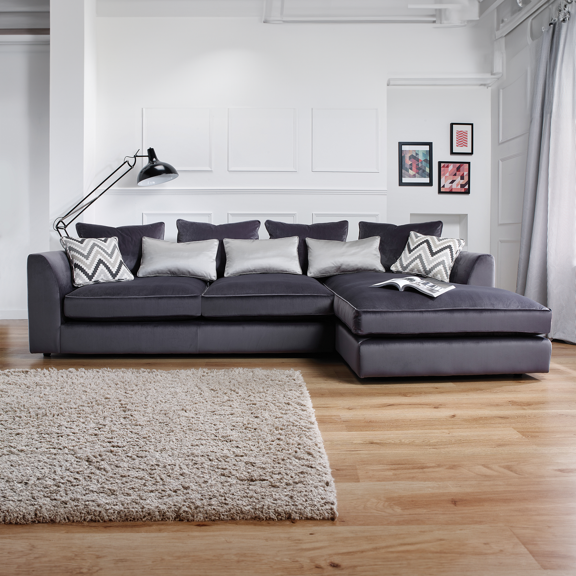 Luxury velvet sofa in plush charcoal fabric