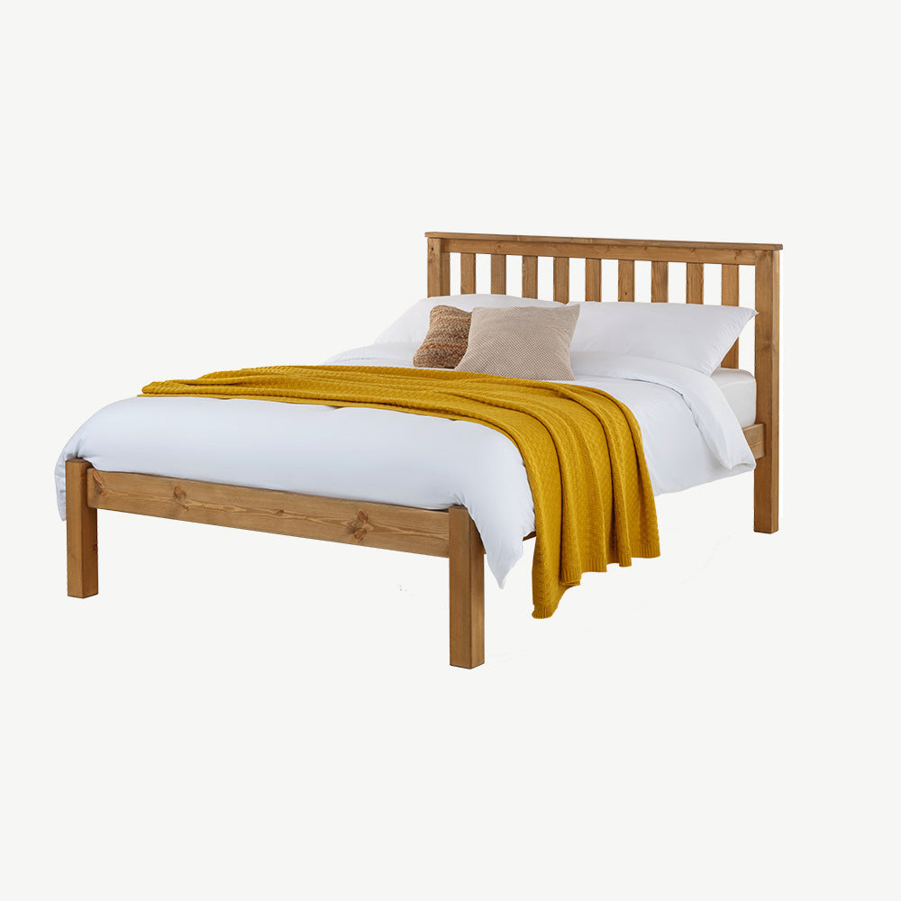 Solid wood bedframe in natural finish