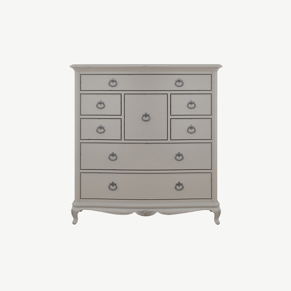 Grey dresser with decorative vase on top