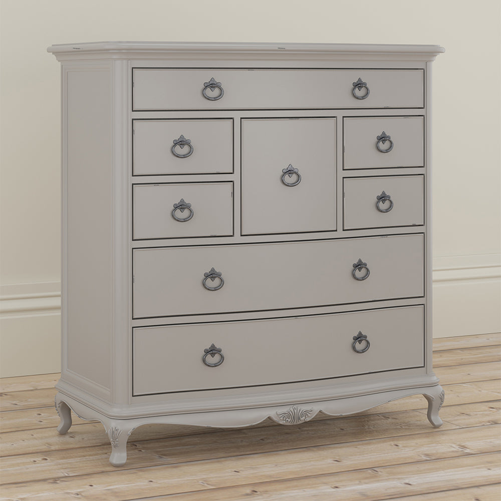 Grey dresser with decorative vase on top