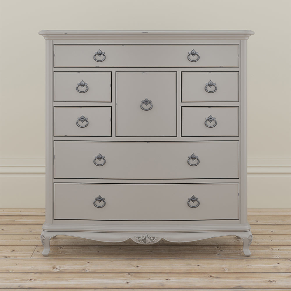 Grey dresser with decorative vase on top