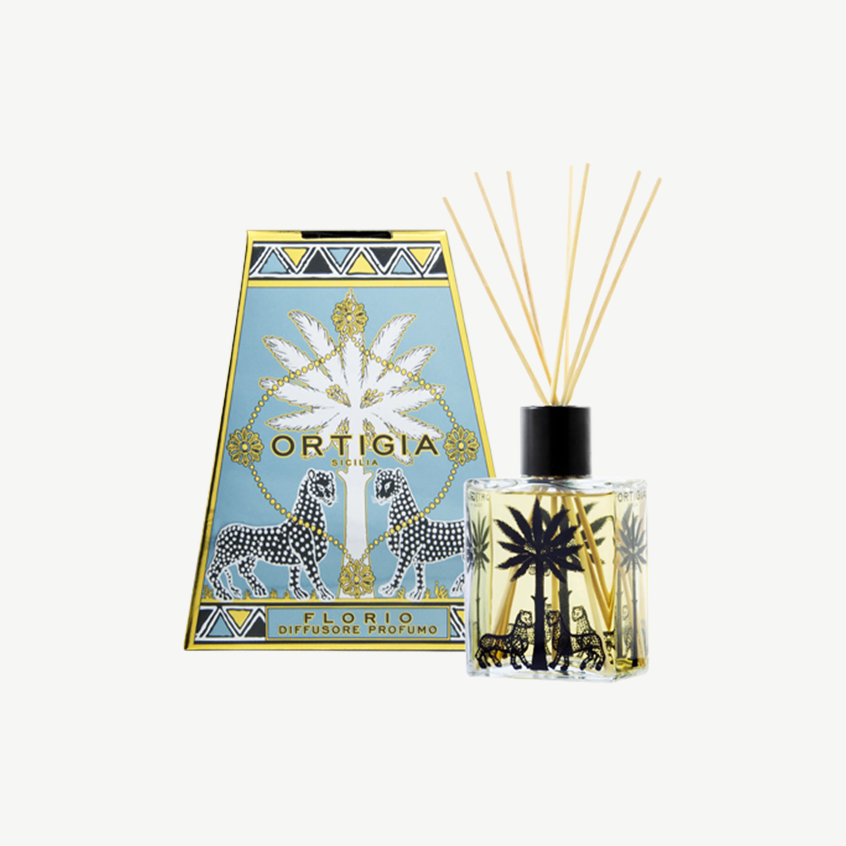 Ortigia Florio Diffuser in signature glass bottle with accompanying natural diffuser reeds
