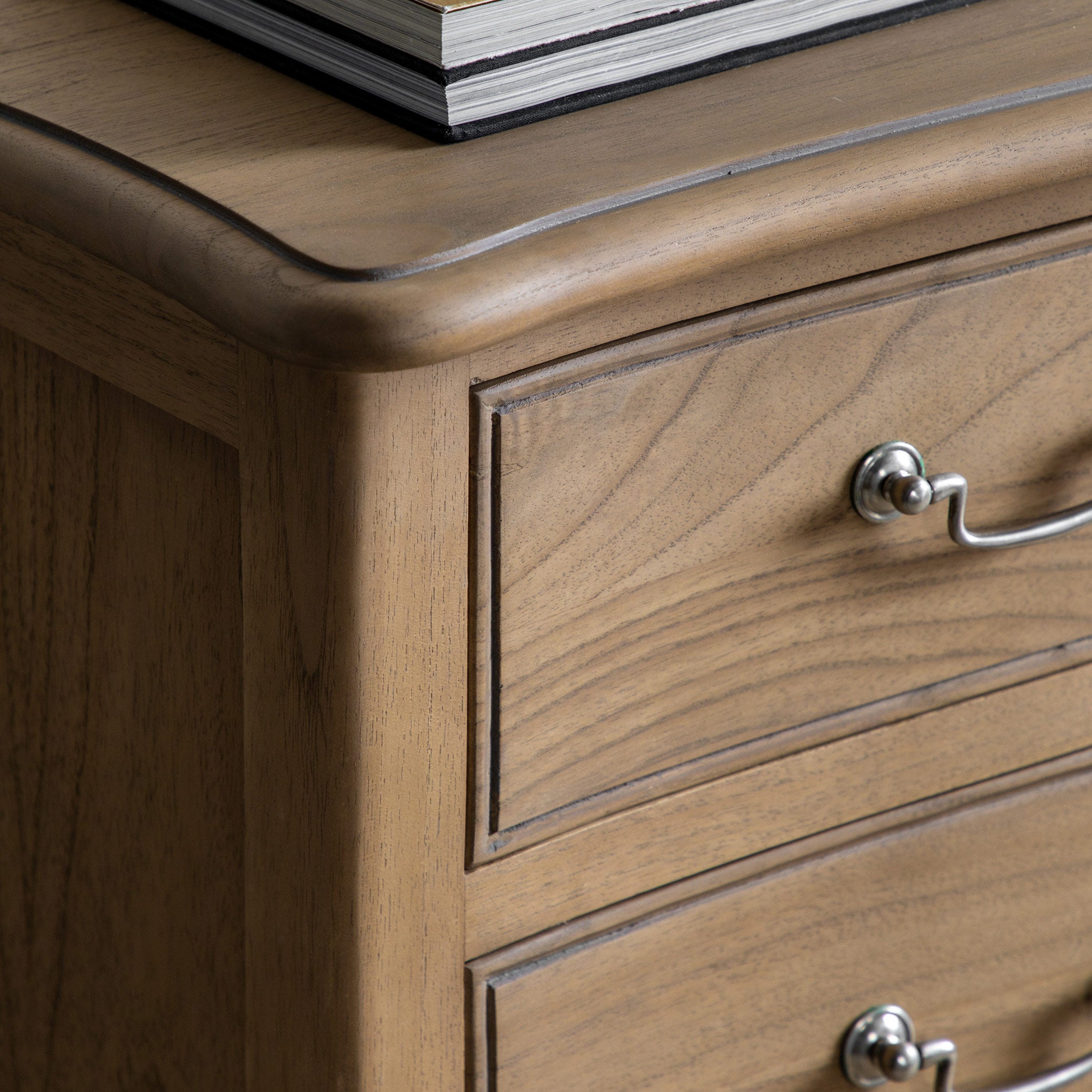 Mindy ash 5 drawer chest in weathered finish featuring dovetailed joints and hand carved sections