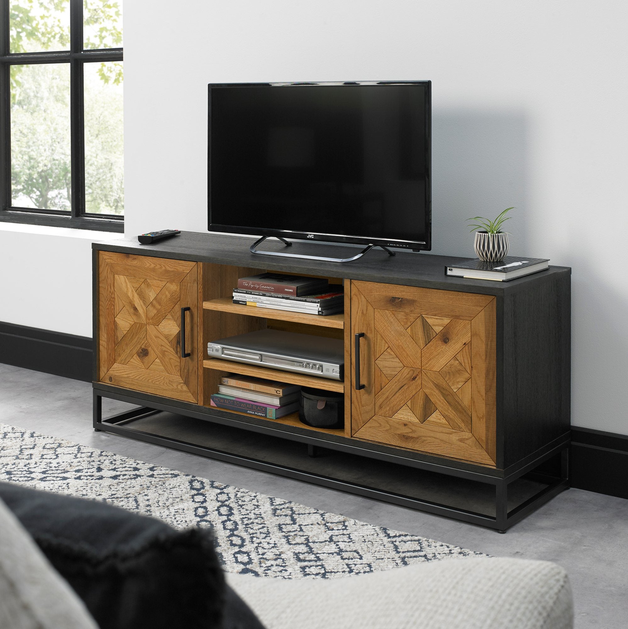 Oak veneer entertainment unit with black powder coated metal base