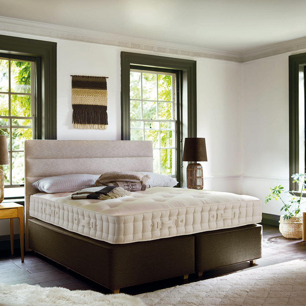 Luxury white mattress in contemporary bedroom setting