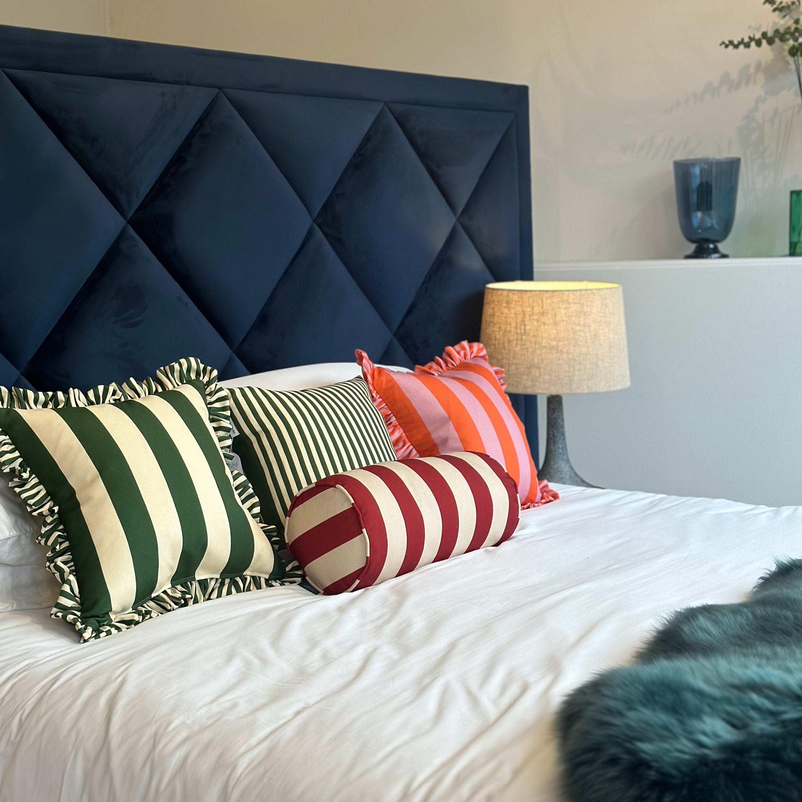 Green and white striped cocktail cushion