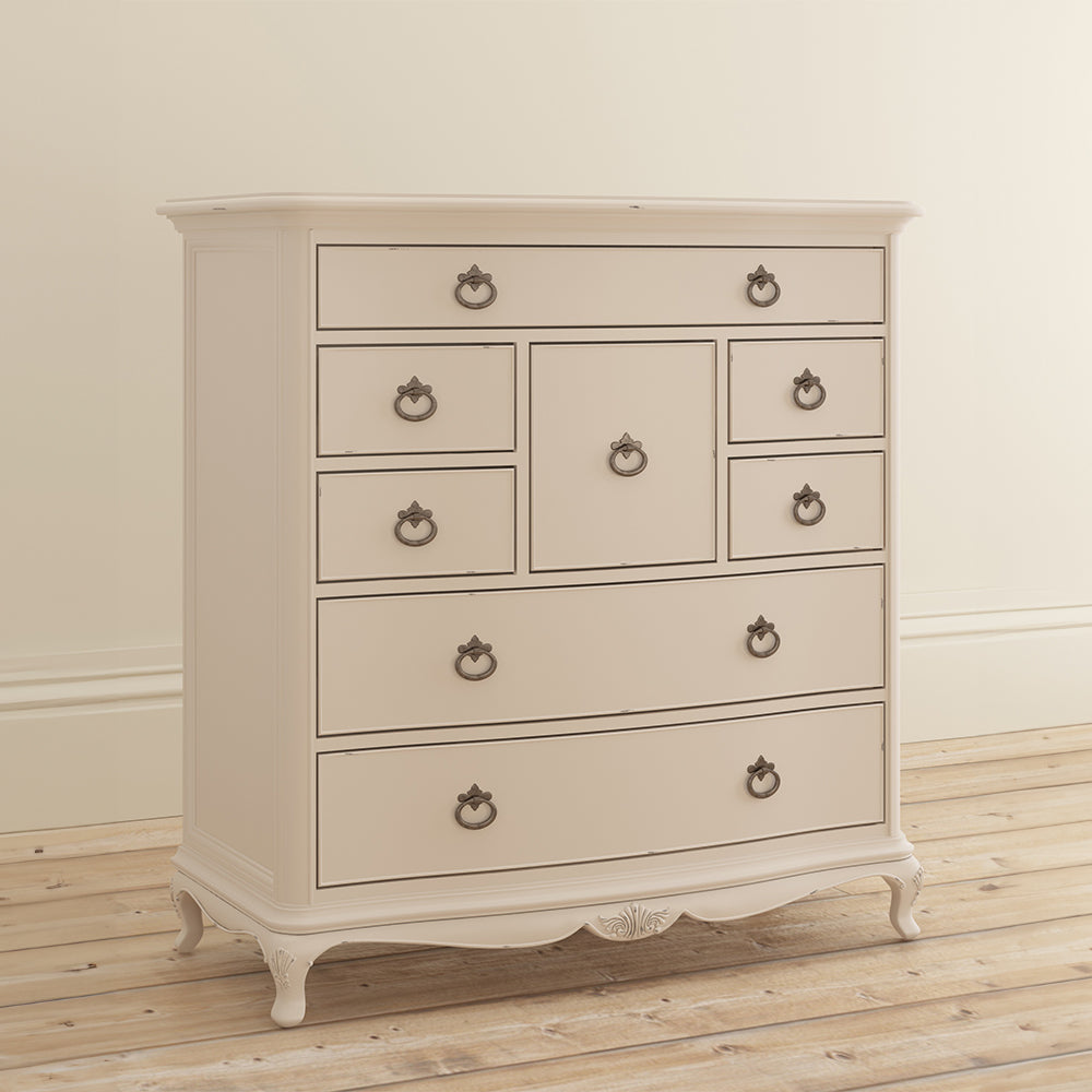 French inspired wooden 8 drawer chest in cream finish with eleven antique bronze handles