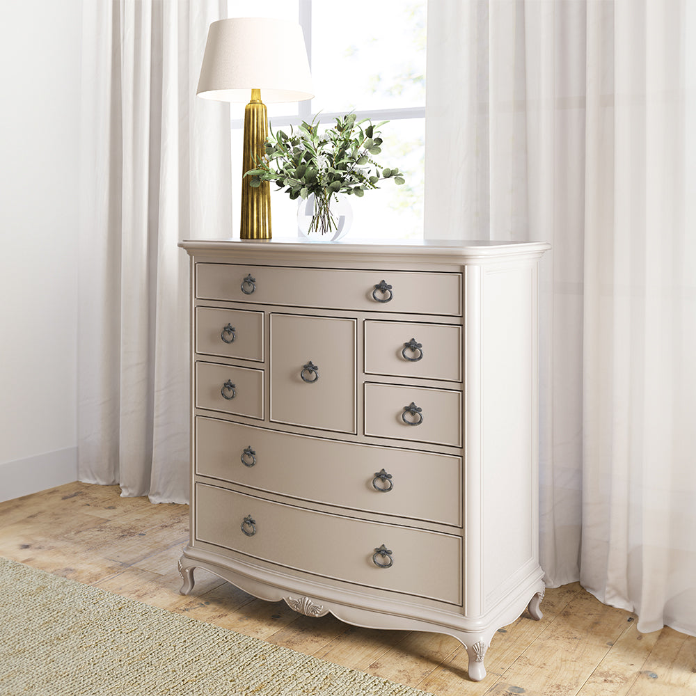 French inspired wooden 8 drawer chest in cream finish with eleven antique bronze handles