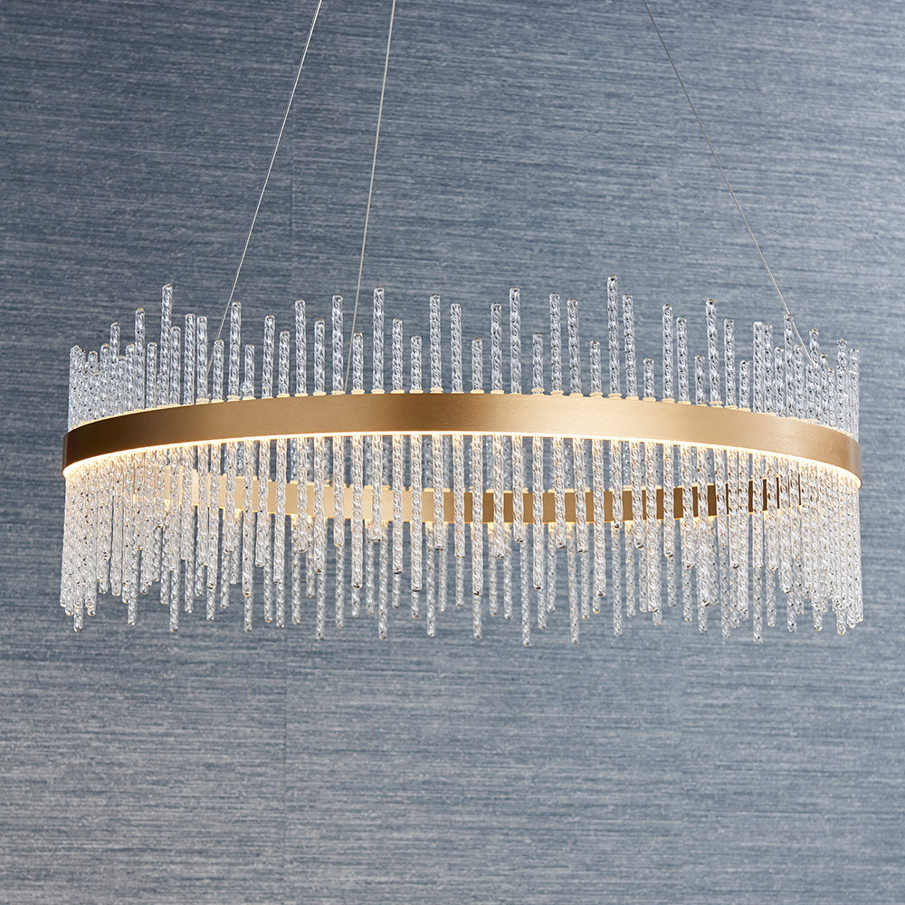Brushed gold plated pendant with twisted clear glass rods