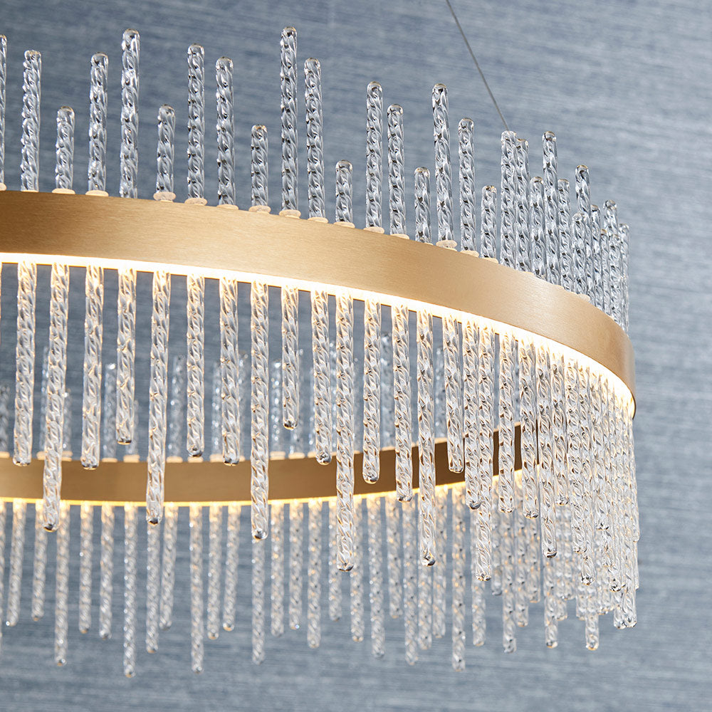 Brushed gold plated pendant with twisted clear glass rods