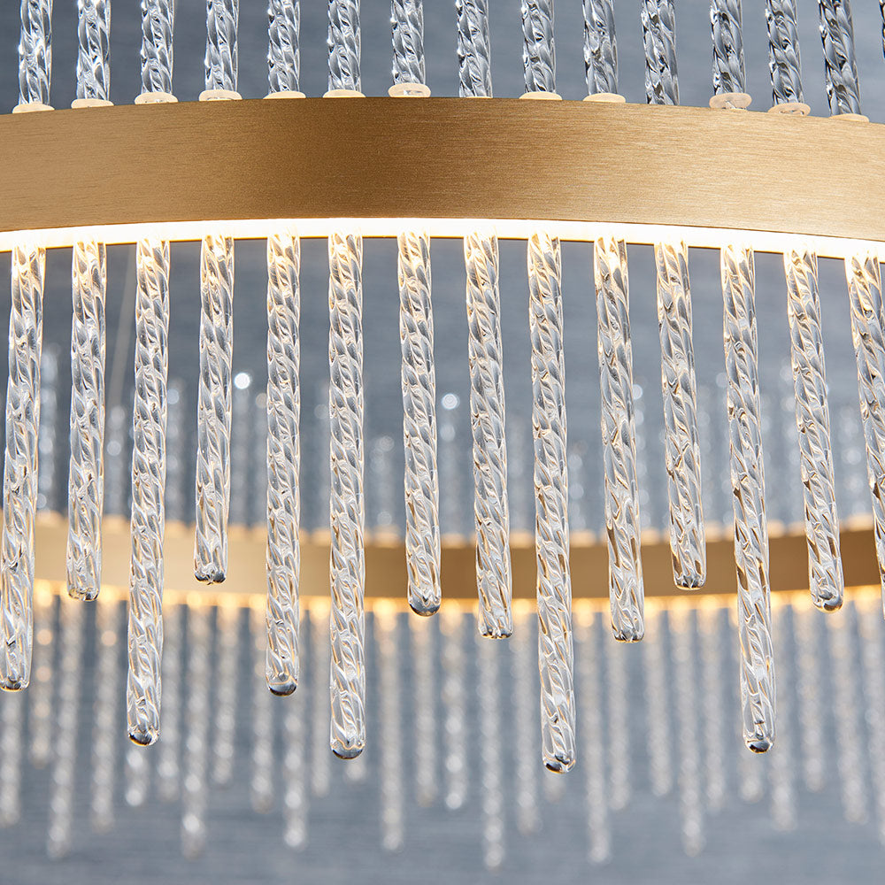 Brushed gold plated pendant with twisted clear glass rods