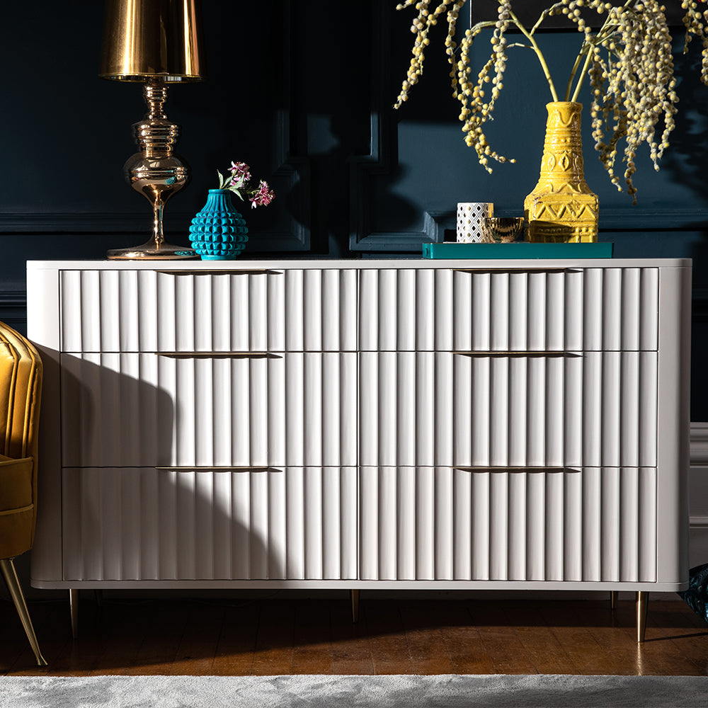 Mahogany 6 drawer chest in neutral ivory finish with corrugated drawer fronts and gold accent handles