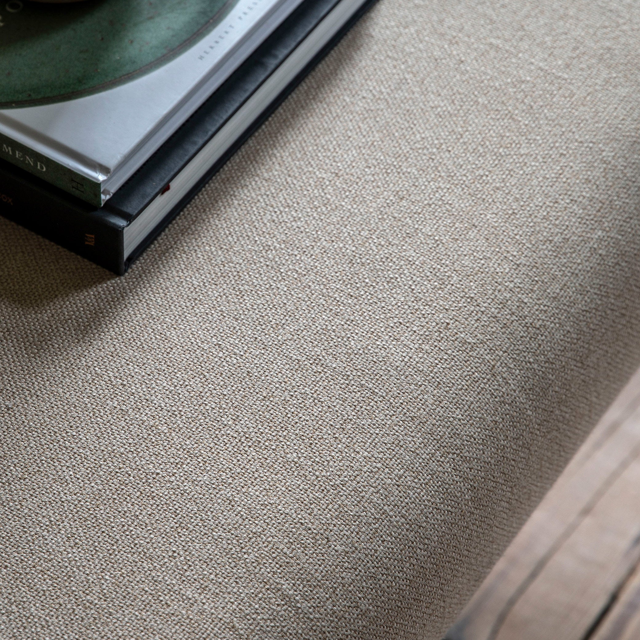 Oak coffee table in lime wash finish, handcrafted bobbing detailed legs and upholstered neutral fabric top