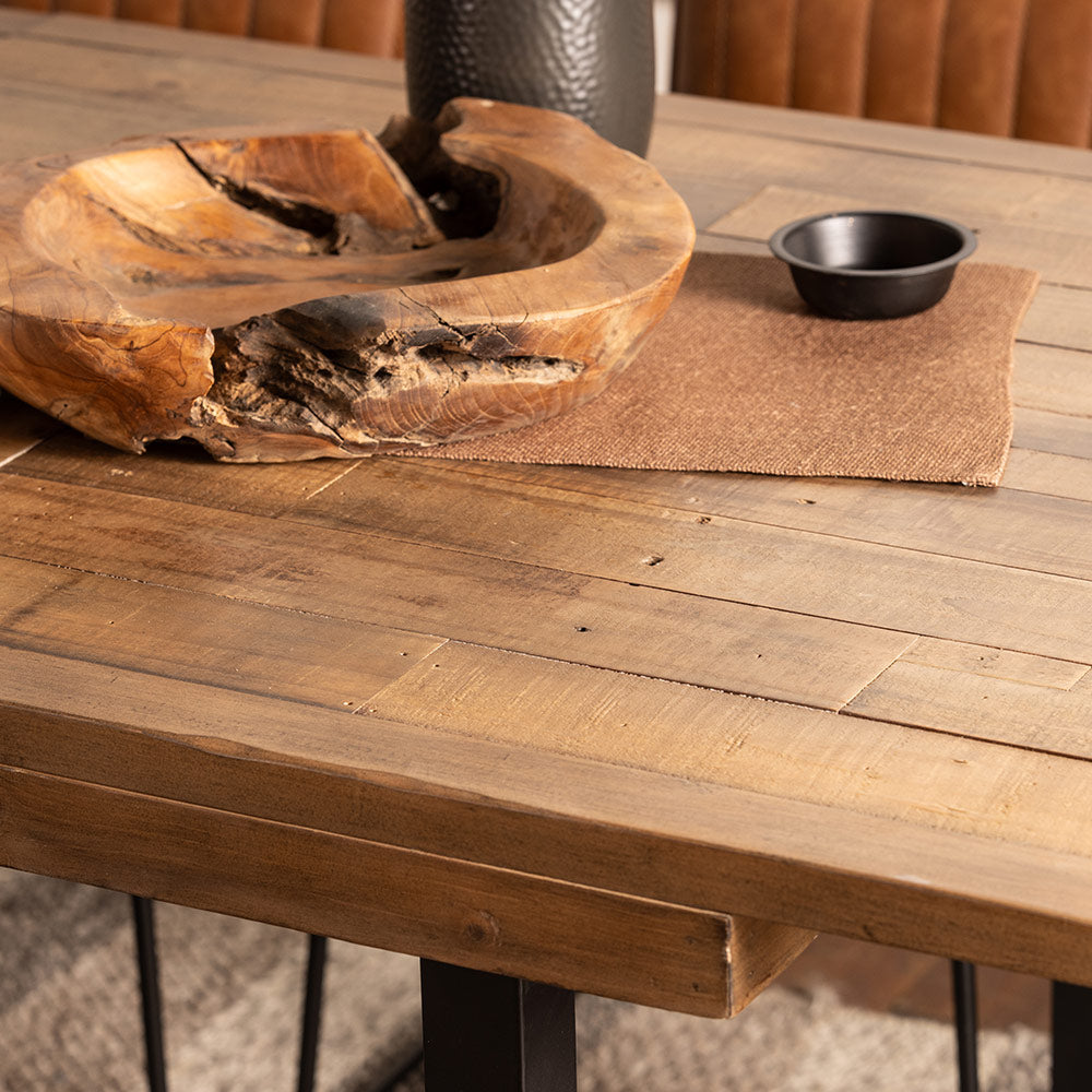Reclaimed timber extending dining table in natural finish and black metal square legs