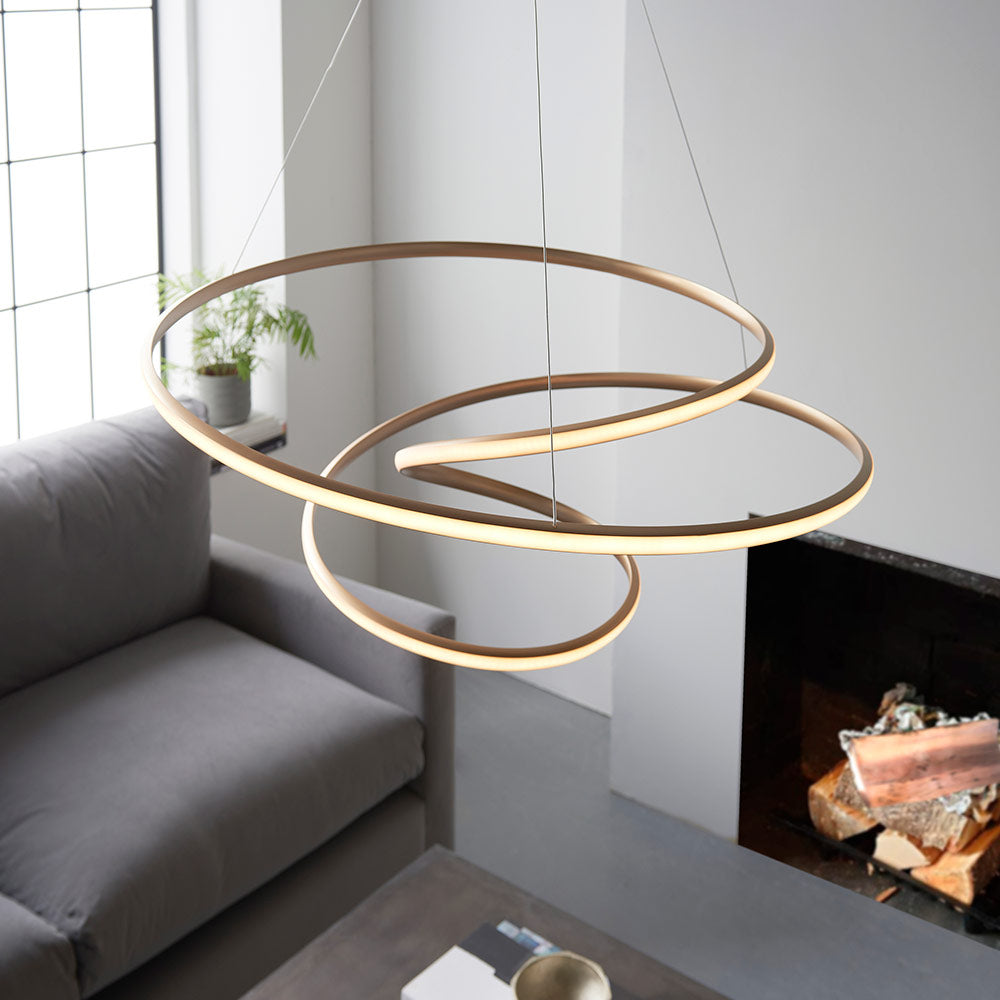 Contemporary gold finished spiral pendant with matt white diffuser