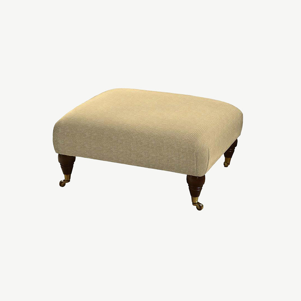 Parker Knoll Moseley Footstool in neutral cream fabric with dark wooden legs