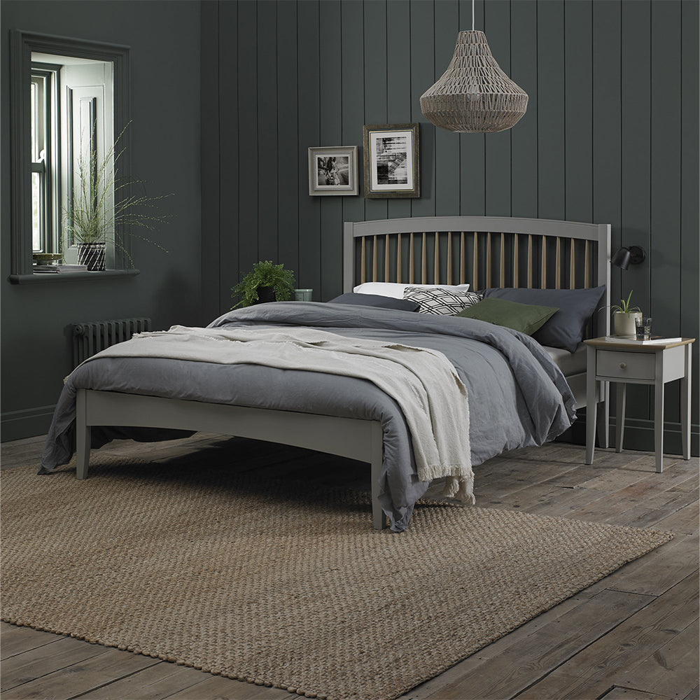 Pale oak bedframe in light grey finish with spindle headboard