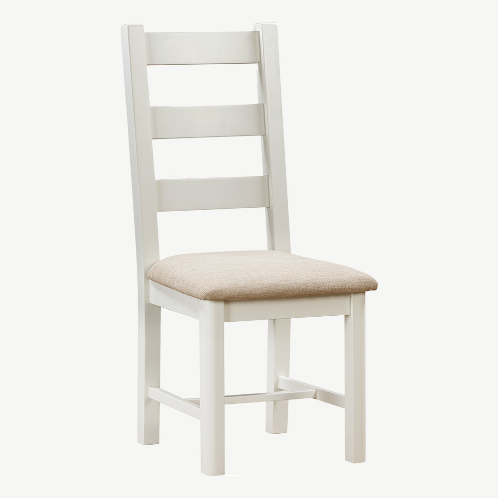 Painted off white ladderback chair with upholstered seat in neutral fabric
