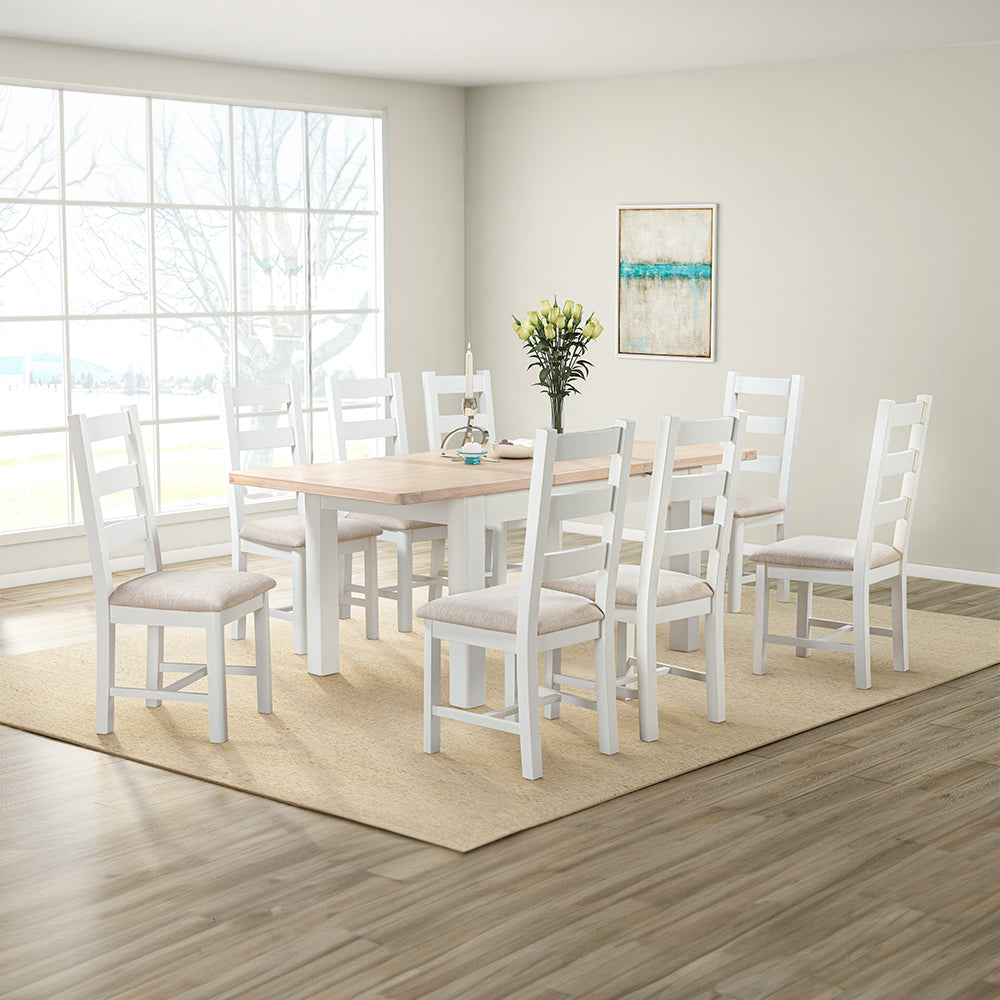 Extending rectangular dining table with natural wood top and painted off-white legs