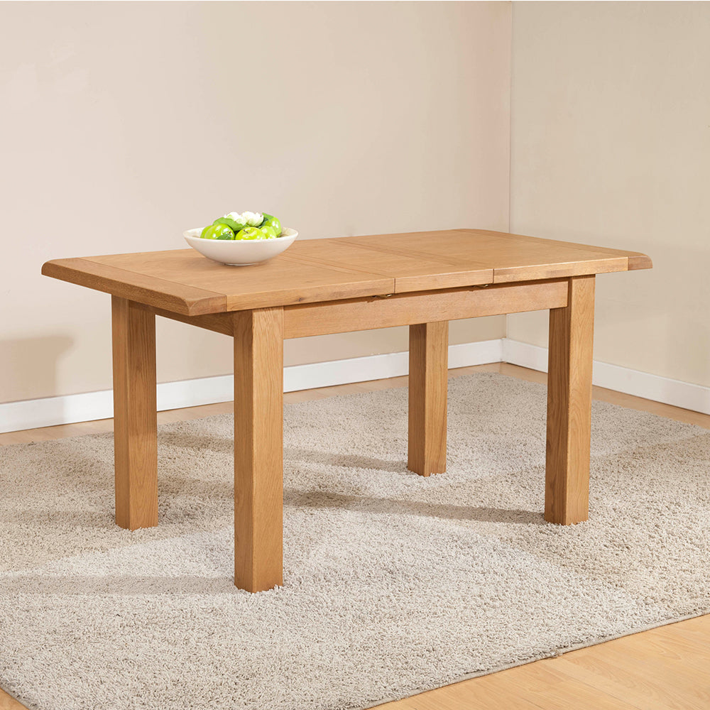 Solid wood extending dining table in natural oak finish