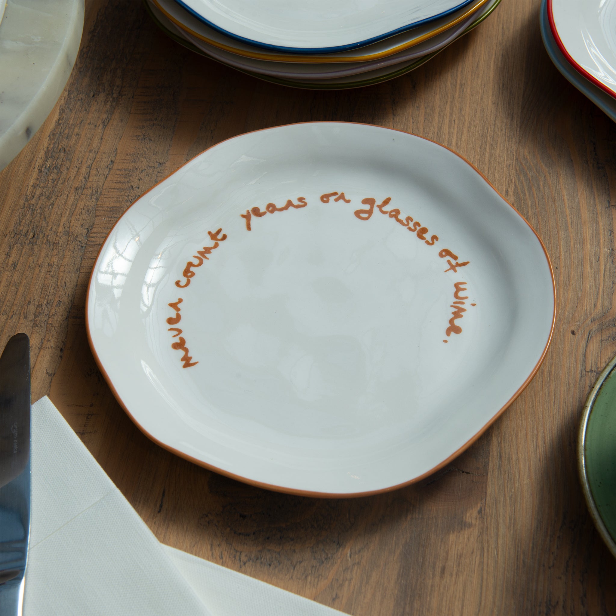 "Never count years or glasses of wine" Orange Decorative Plate