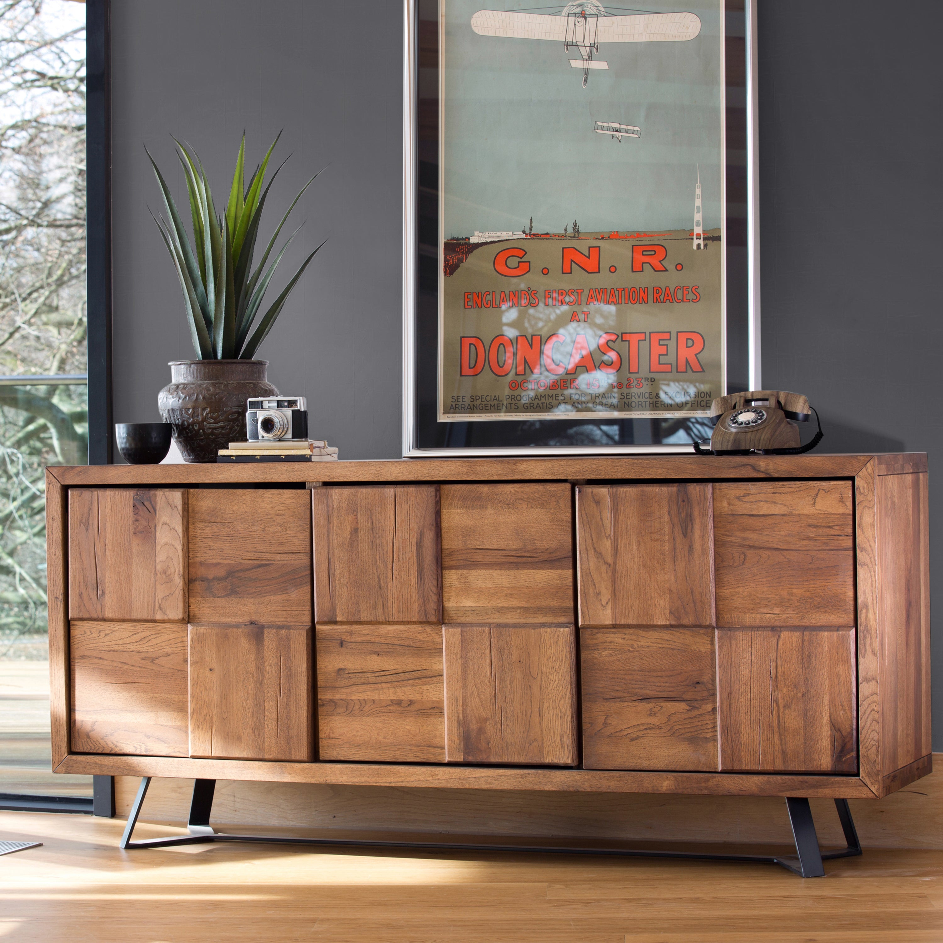 Solid oak checkerboard front sideboard in natural finish with black powder coated metal legs