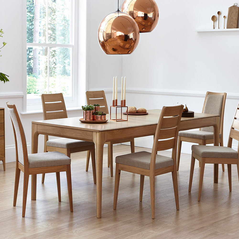 Ercol Romana solid oak dining table in clear matt finish