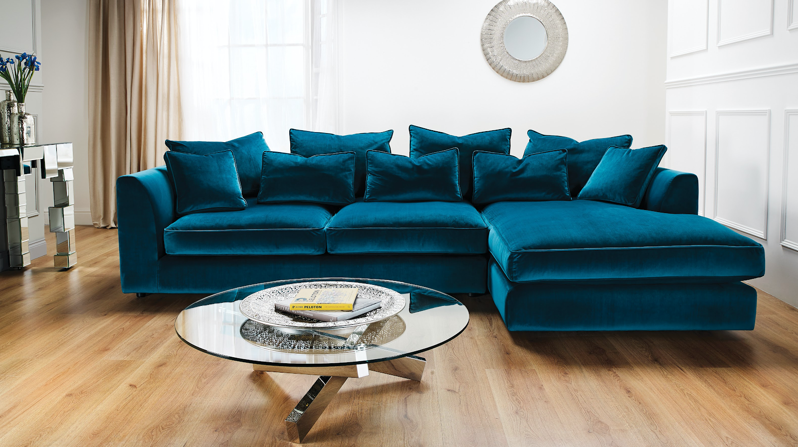 Teal velvet corner sofa in living room
