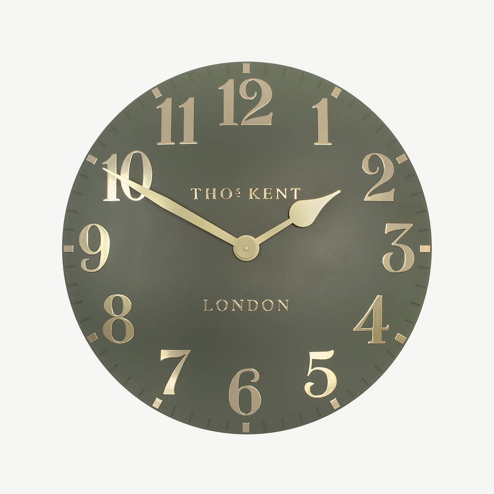 Arabic wall clock in lichen green