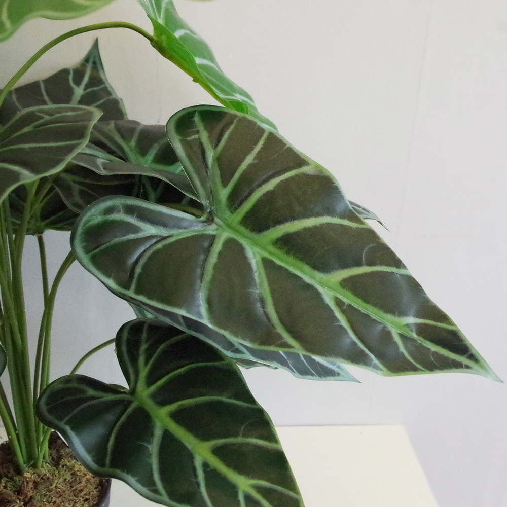 Artificial green fern plant with metal stand and planter
