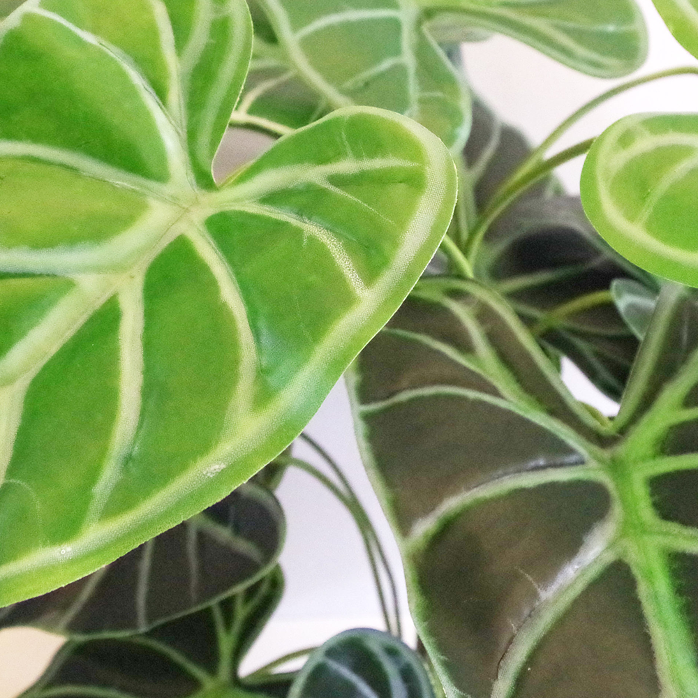 Artificial green fern plant with metal stand and planter