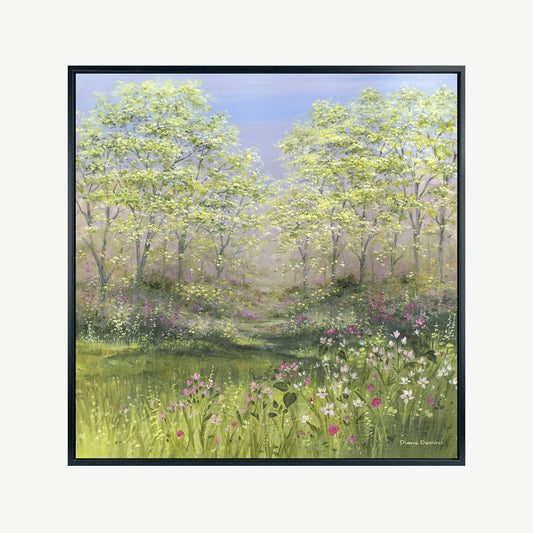 Summer meadow scene with green grass and trees in a sleek black frame