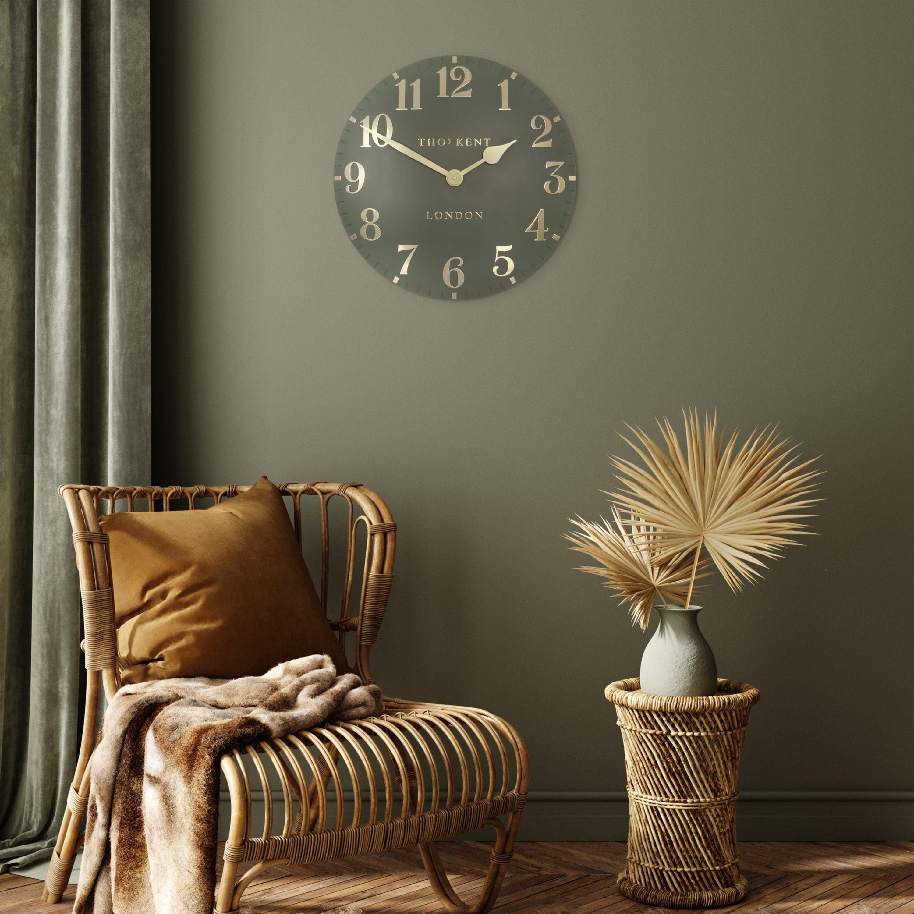 Arabic wall clock in lichen green