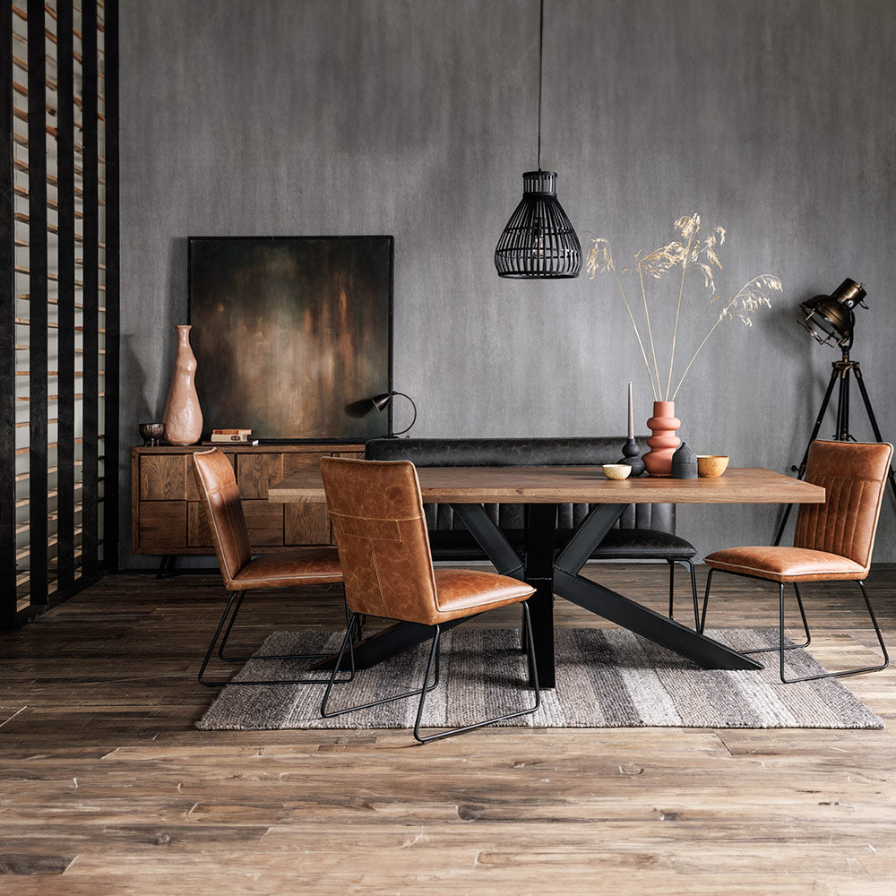 Rustic solid oak dining table with star burst effect black legs
