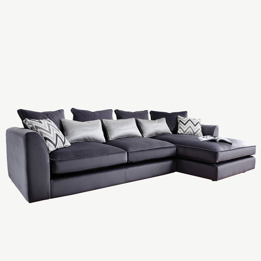 Luxury velvet sofa in plush charcoal fabric
