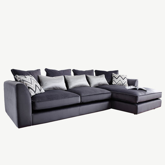 Luxury velvet sofa in plush charcoal fabric
