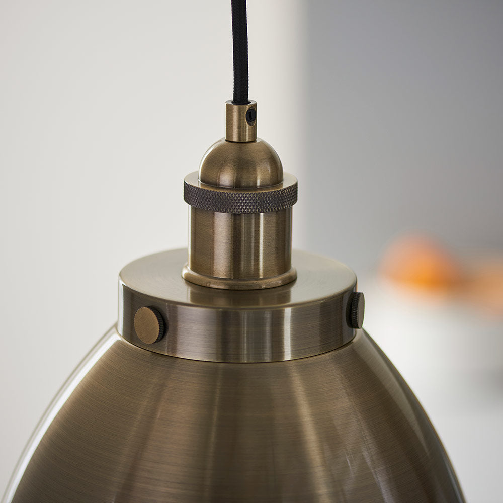 Modern small pendant in antique brass plated finish