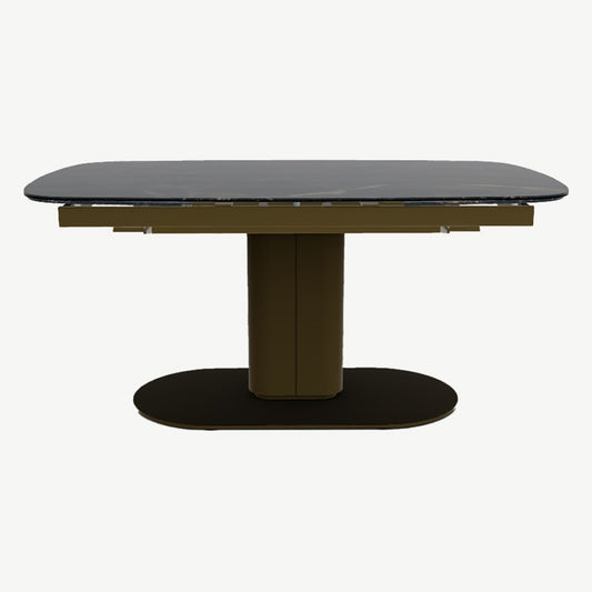 Black marble top extending dining table with matt bronze frame and floor plate
