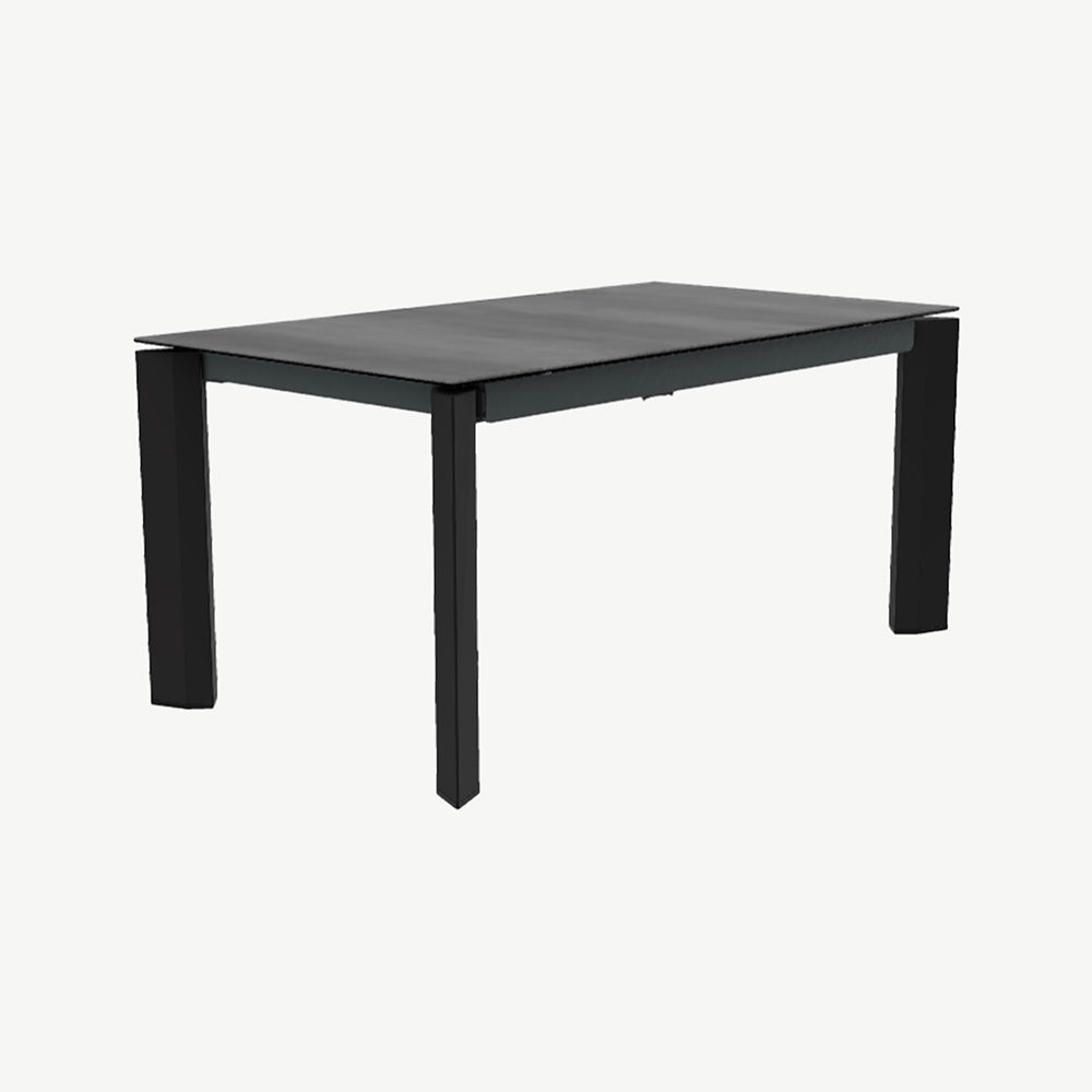 Cement top extending dining table with black legs
