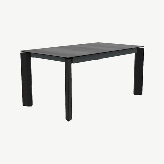 Cement top extending dining table with black legs
