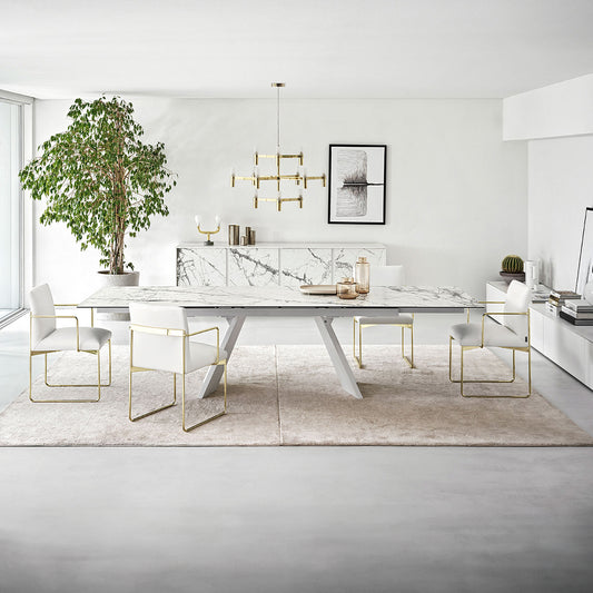 White marble top extending dining table with matt white frame and brushed white legs
