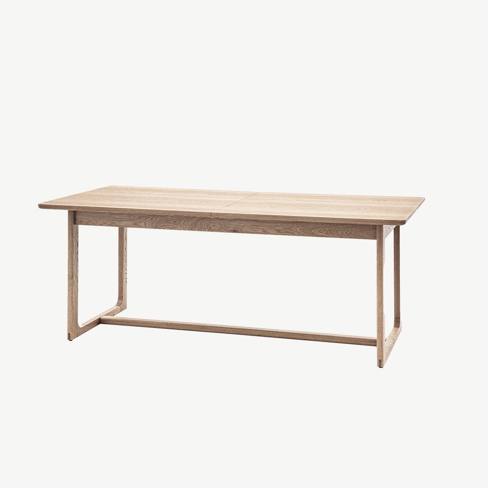 Oak veneer extending dining table in smoked oak finish