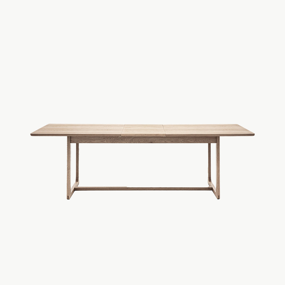 Oak veneer extending dining table in smoked oak finish