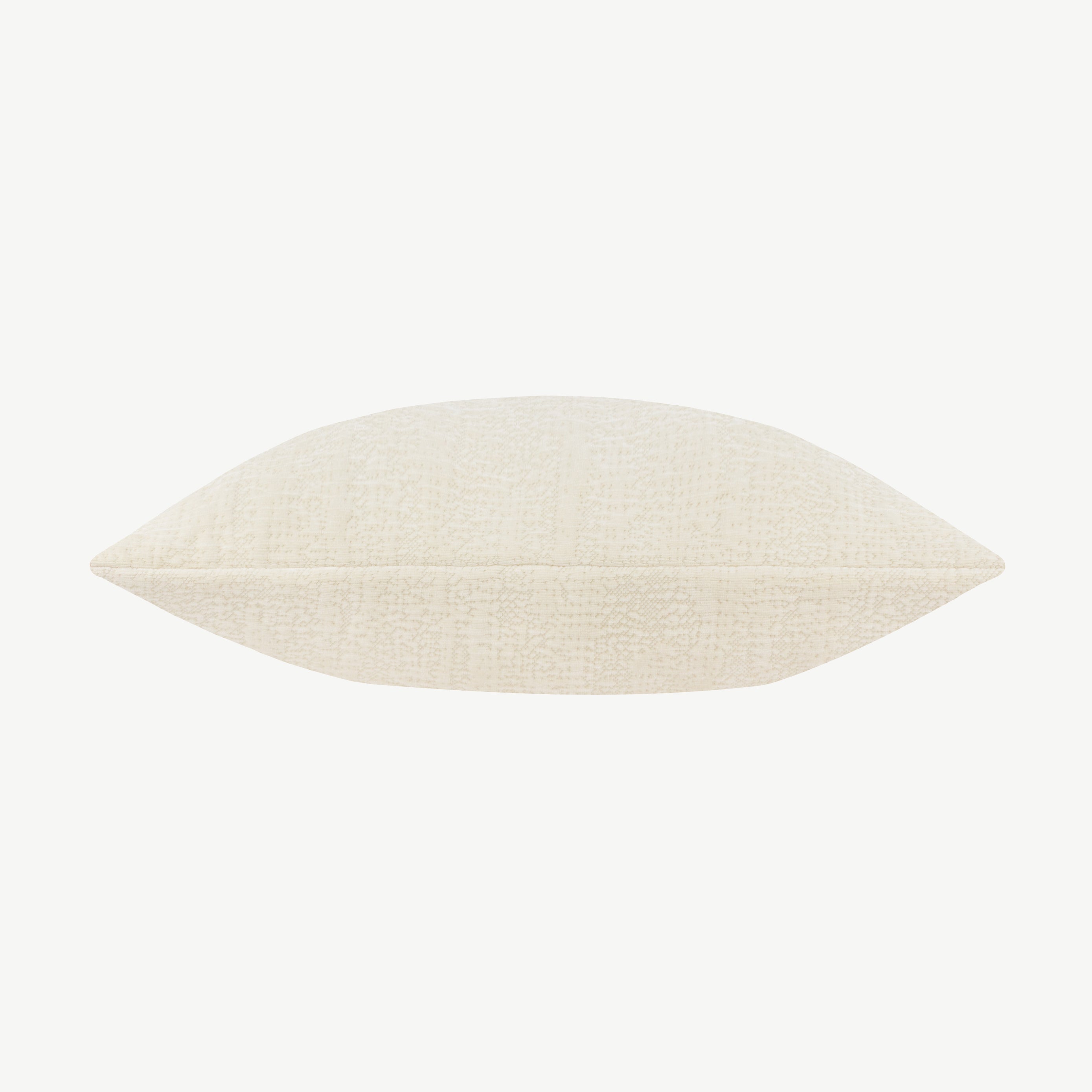 Chenille fabric throw cushion in neutral cream