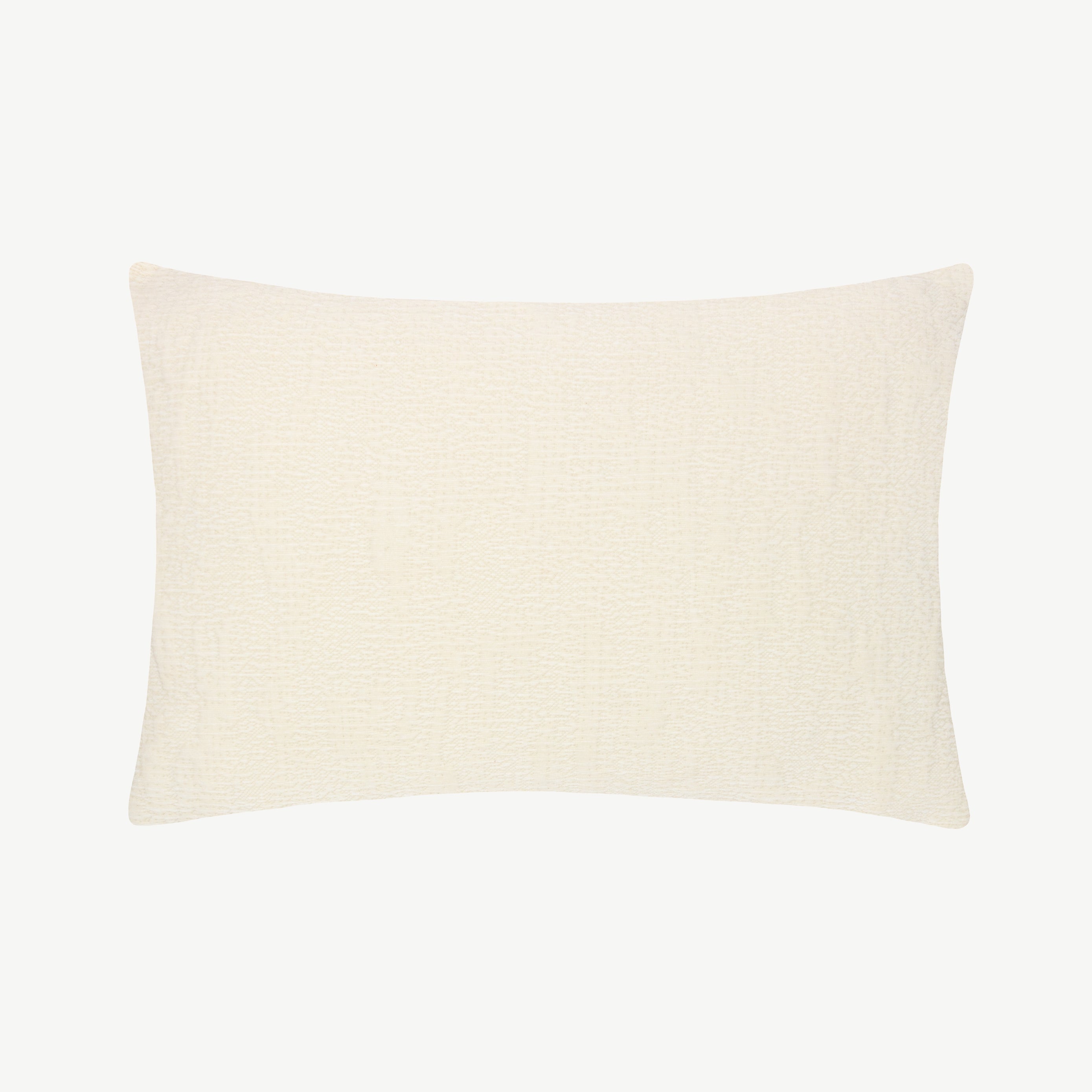 Chenille fabric throw cushion in neutral cream