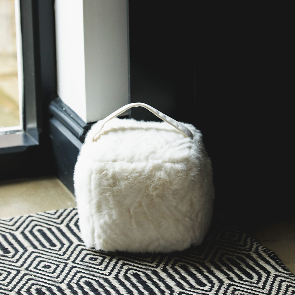 Plush Faux Fur Door Stop in Ecru